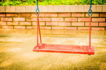 Playground swing in the parkの写真素材