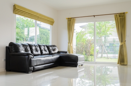 Interior room with black sofa in living room areaのeditorial素材