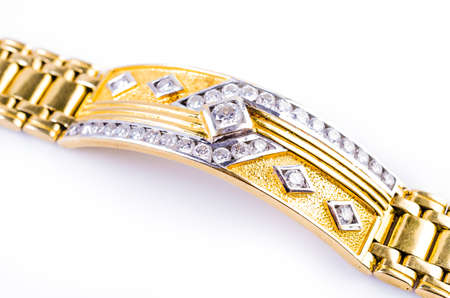 Gold bracelet on isolated whiteの写真素材