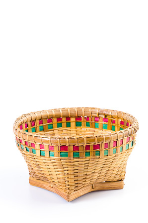 Wicker basket on isolated whiteの写真素材