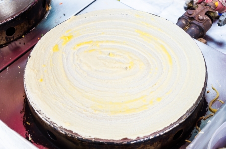 Crepe in hot panの写真素材