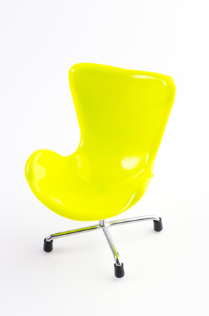 Green chair isolated on white の写真素材