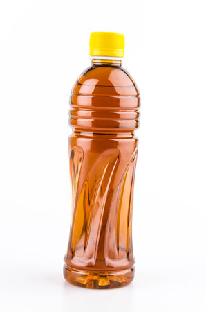 Tea bottle isolated white backgroundの写真素材