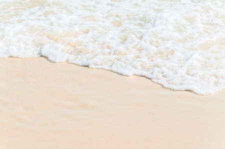 Sea wave and sand using as backgroundの写真素材