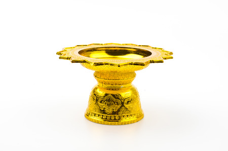 Gold tray isolated white backgroundの写真素材