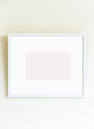 White frame on white wallの写真素材