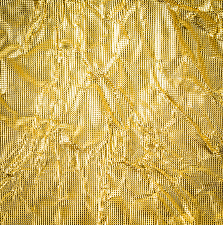 gold paper crumpled texture background