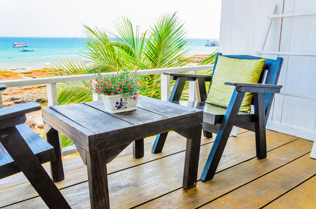 Wood chair on the beachの写真素材