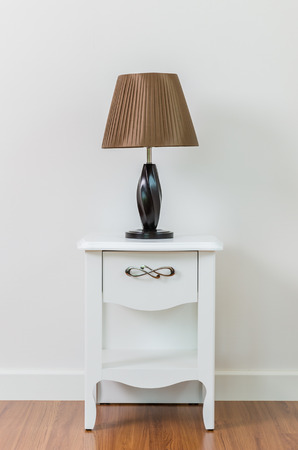 Lamp on bedside table interior roomの写真素材