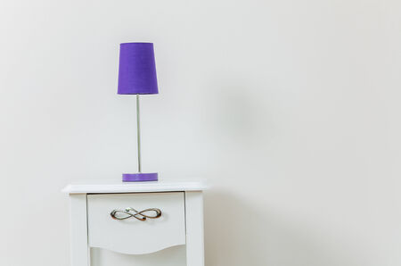 Lamp on bedside table interior roomの写真素材