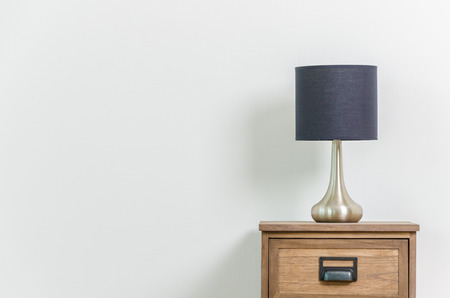 Lamp on bedside table interior roomの写真素材
