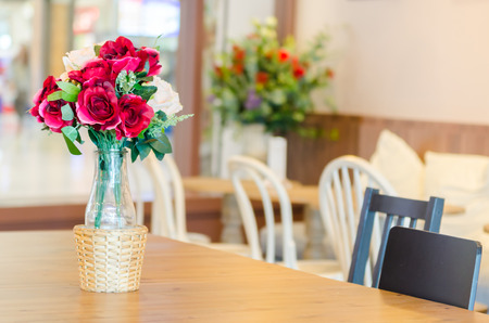 Vase flowers in coffee shopの写真素材