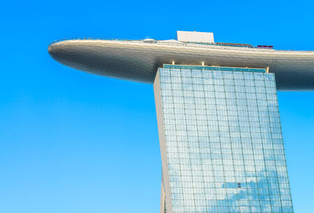 SINGAPORE-JUNE 24: The Marina Bay Sands Resort Hotel in Singapore. It is an integrated resort and the world's most expensive standalone casino property at S$8 billion.のeditorial素材