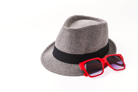 Hat , sunglasses isolated on whiteの写真素材