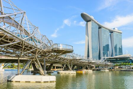 SINGAPORE - June 2014:Front view of the Marina Bay Sands Resort at the mouth of the Singapore River June 25, 2014 in Singapore. This waterfront resort and casino is a tourist attraction.のeditorial素材