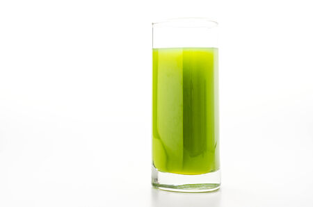 Kiwi juice glass isolated on whiteの写真素材