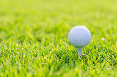 Golf ball on green grassの写真素材