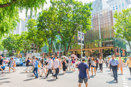 SINGAPORE-JUNE 26:Aerial view of sidewalk of Orchard road in Singapore on JUNE 26, 2014. Orchard road is one of best shopping district in Singapore.のeditorial素材