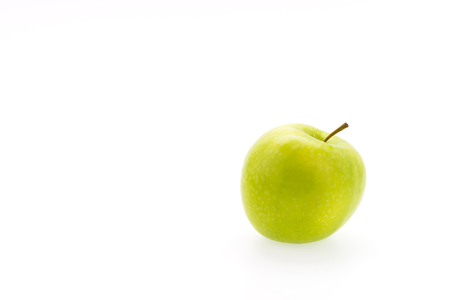 Green apple isolated on whiteの写真素材