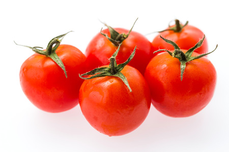 Tomato isolated on whiteの写真素材