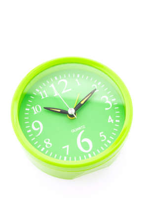 Green clock isolated on white background