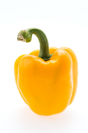 Yellow pepper isolated on whiteの写真素材