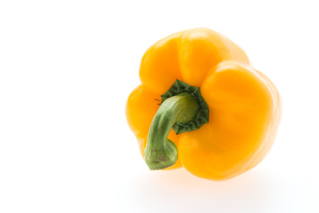 Yellow pepper isolated on whiteの写真素材