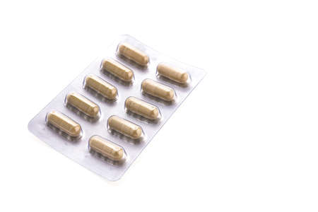 Capsule pill isolated on white backgroundの写真素材