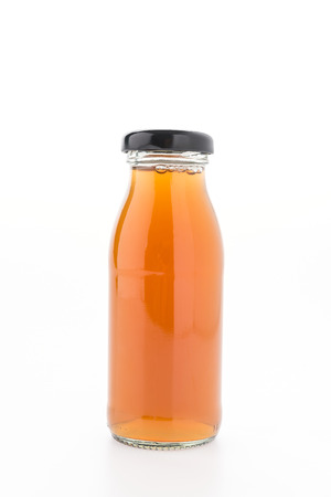 Apple juice bottle isolated on white backgroundの写真素材