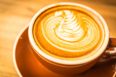 Latte art coffee process vintage style pictureの写真素材