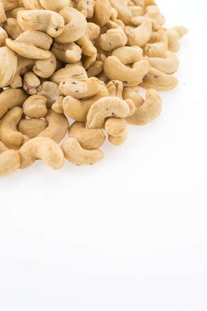 cashews isolated on white backgroundの写真素材