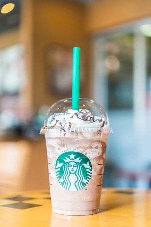 Bangkok ,Thailand- OCT 30 : Frappuccino Chocolate Blended Beverages served at wood table in starbuck shop at Central Department store Rattatibet , Bangkok, Thailand.のeditorial素材
