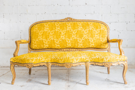 Yellow Vintage sofaの写真素材