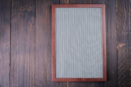Blank board on wooden background - vintage effect style pictures