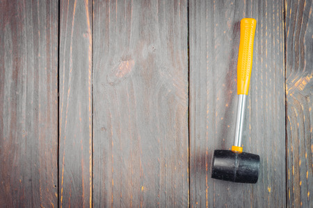 Hammer on wooden background - vintage effect style picutresの写真素材