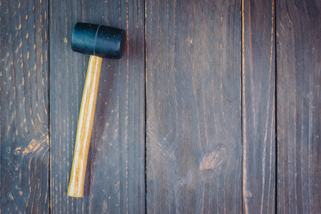 Hammer on wooden background - vintage effect style picutresの写真素材