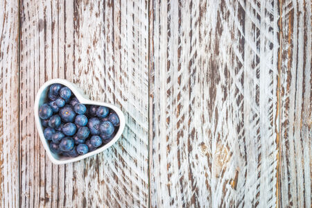 Blueberry cup on wooden backgroundの写真素材