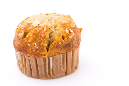 Banana muffin isolated on white backgroundの写真素材