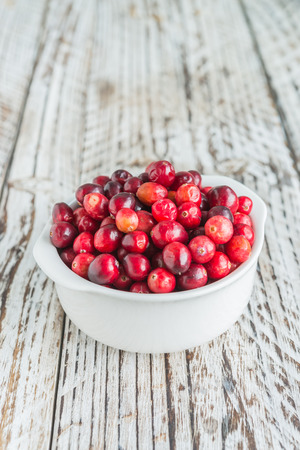 Cranberry on wooden backgroundの写真素材
