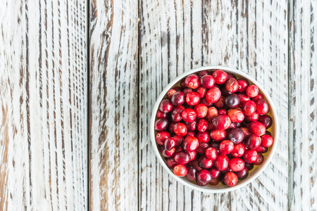 Cranberry on wooden backgroundの写真素材