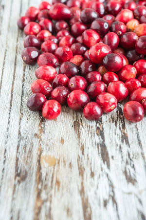 Cranberry on wooden の写真素材