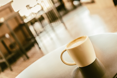 Coffee cup in coffee shop - vintage effect style picturesの写真素材