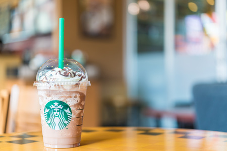 Bangkok ,Thailand- OCT 30 : Frappuccino Chocolate Blended Beverages served at wood table in starbuck shop at Central Department store Rattatibet , Bangkok, Thailand.のeditorial素材