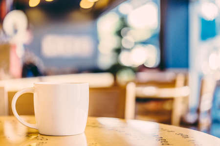Coffee cup in coffee shop - vintage effect style picturesの写真素材