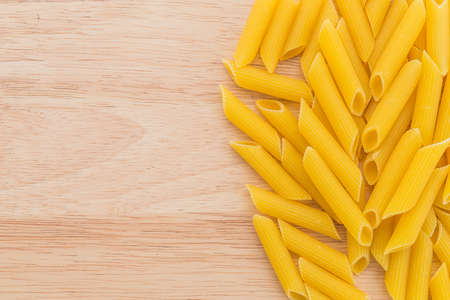 Pasta on wooden backgroundの写真素材