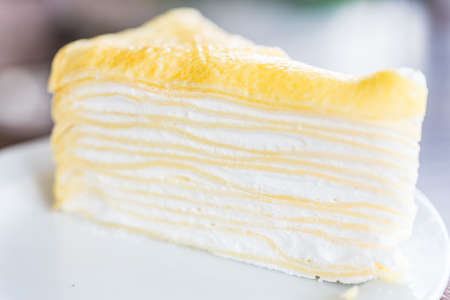 Dessert crepe cakes in white plate - selective focusの写真素材