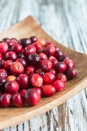 Cranberry on wooden backgroundの写真素材