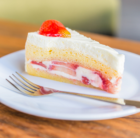 Strawberry cream cakes on white plateの写真素材