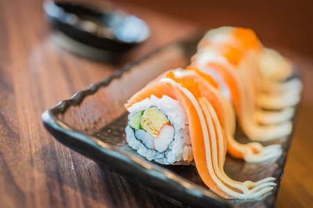 Raw fresh Salmon sushi roll maki - japanese foodの写真素材
