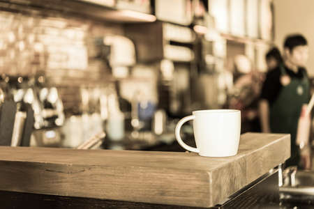 Coffee cup in coffee shop - vintage effect style picturesの写真素材